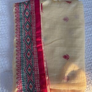 Cream/pale yellow saree